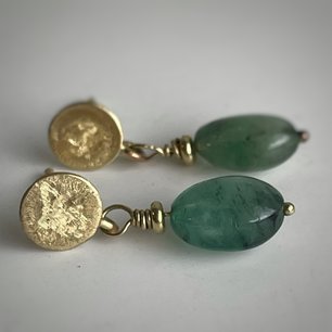 Oorstekers met smaragd